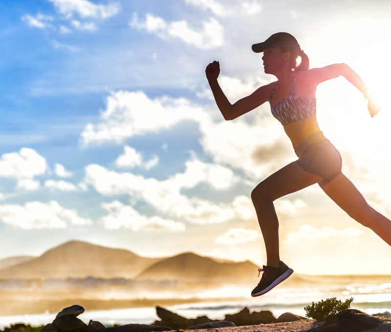 Woman running wearing the Flow Fairy menstrual cup